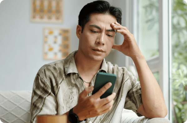 man experiencing eye pain and headache from recurrent corneal erosion