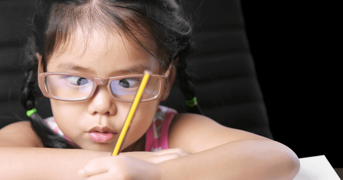 Child having a strabismus eye examination