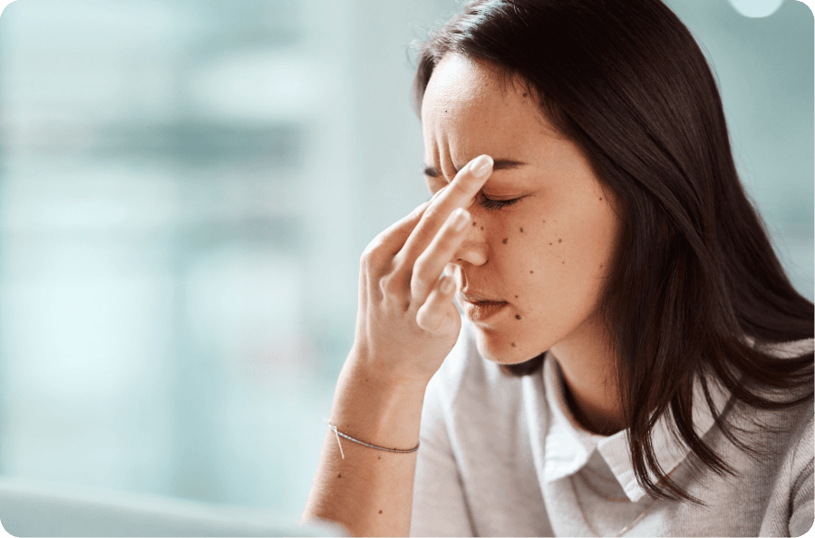 woman with eye irritation from pterygium triggers