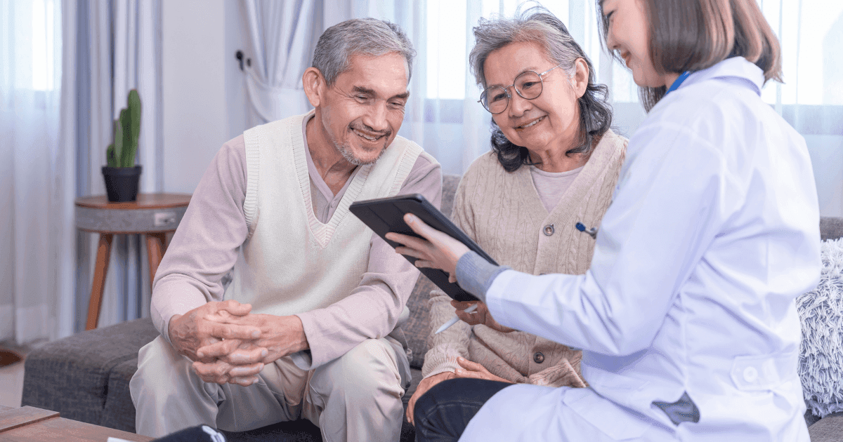 Senior couple consulting an eye doctor about cataract awareness and eye care