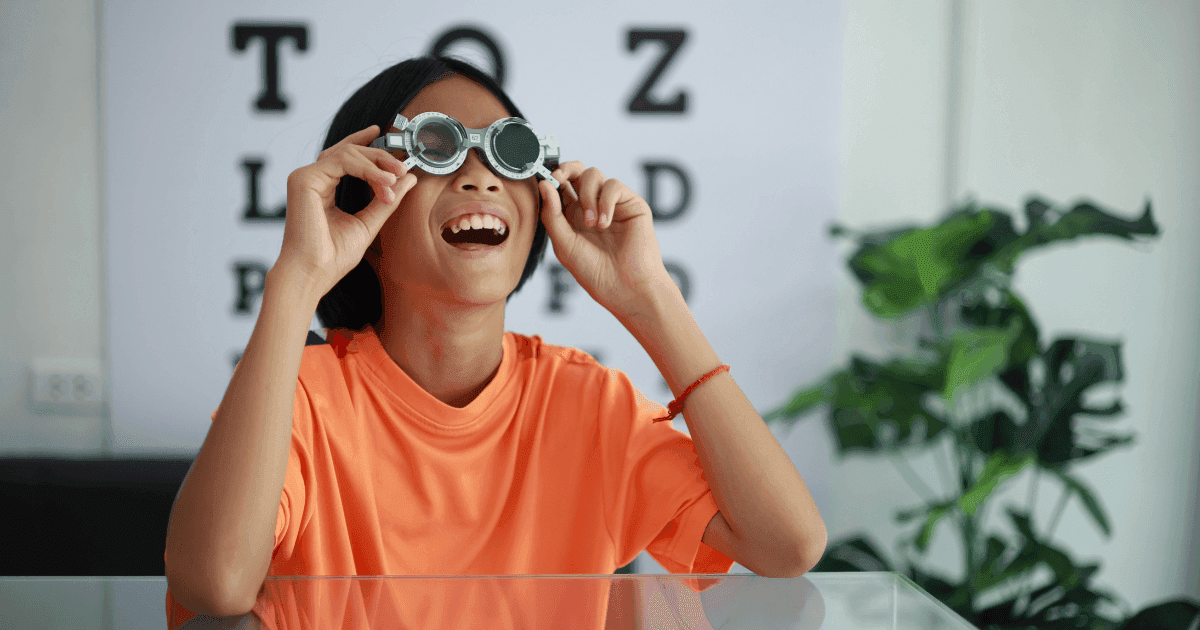 Child wearing glasses for strabismus treatment