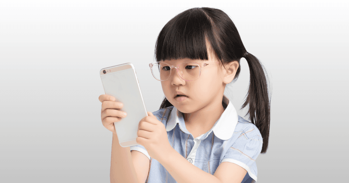 Asian girl with glasses are holding a phone